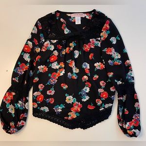 Zoe & Rose black kids blouse with flower print.
